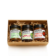 Three jars of Grunds Gourmet relish in a box on a white background