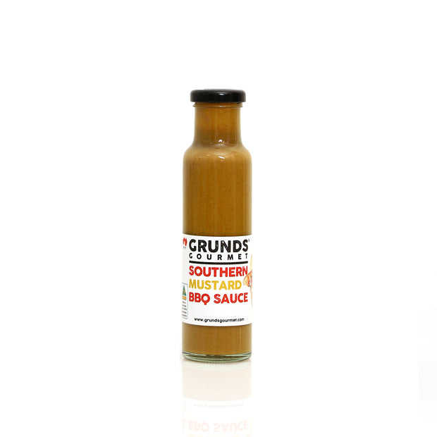 Bottle of Grunds Gourmet Southern Mustard BBQ Sauce on a white background