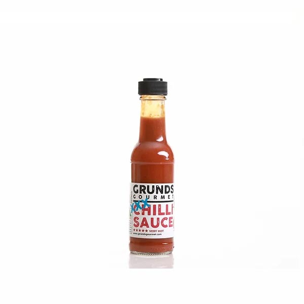 Bottle of Grunds Gourmet Chilli Sauce on a white background